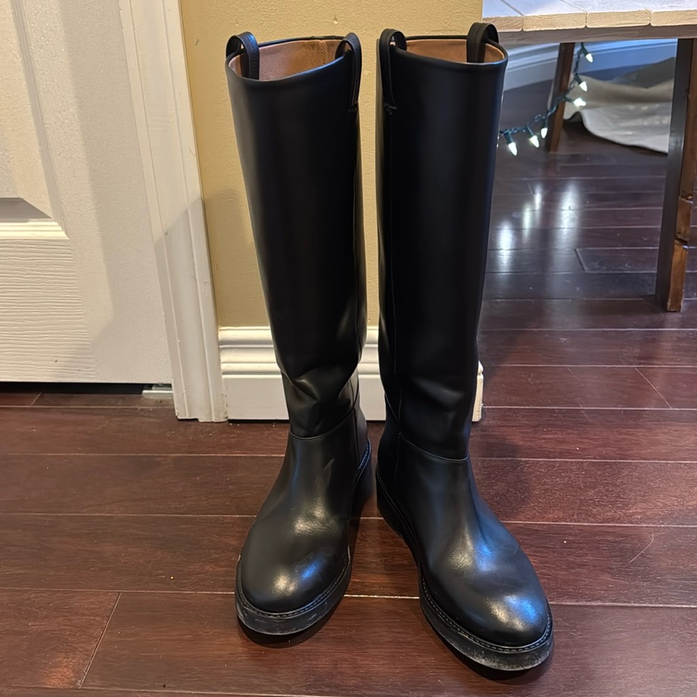 Only worn once, Riding boots by Flattered